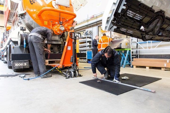 KOKS Group staff working on a vacuum truck
